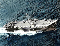 A military ship in the water

Description automatically generated